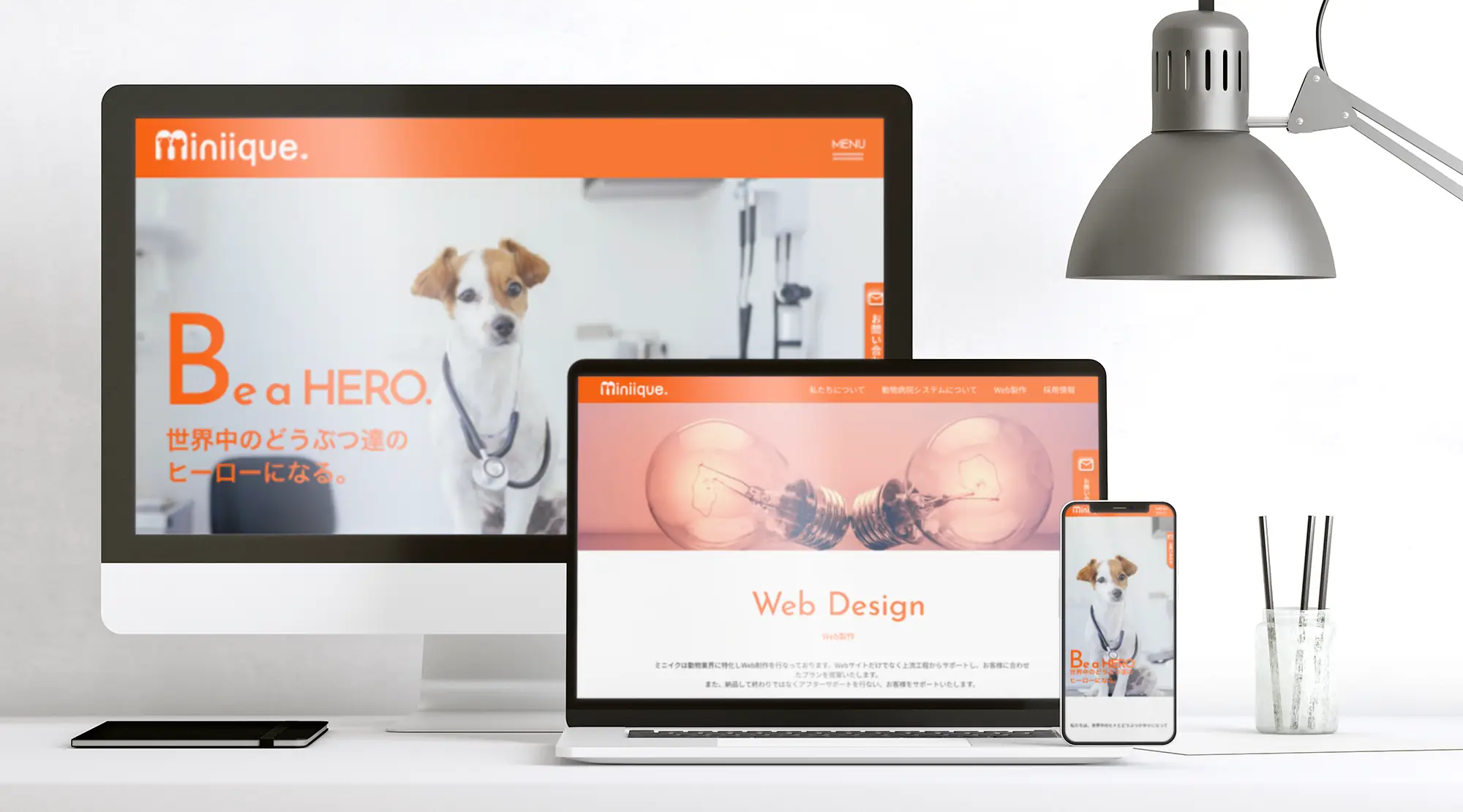株式会社ミニイク様のトップページを表示したラップトップ、タブレット、スマホのモックアップ画像